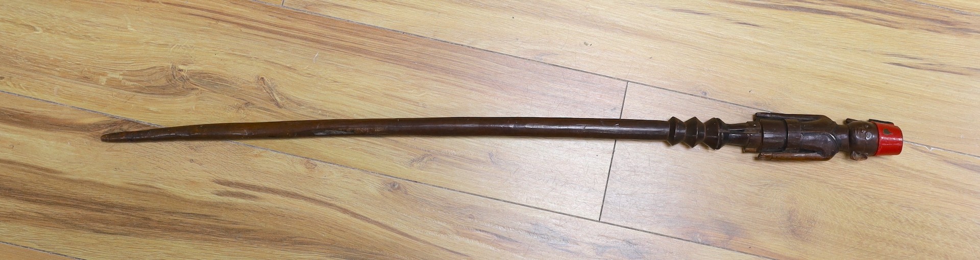 An early 20th century Nyassaland figural carved walking cane (Kings African Rifles) 87cm long